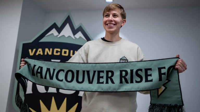 Quinn is pictured during an announcement of their signing to the Vancouver Rise in Vancouver, on Friday, January 17, 2025. (Ethan Cairns/CP)