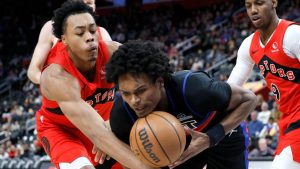 Toronto Raptors forward Scottie Barnes (4) defends against Detroit Pistons forward Ausar Thompson (9) during the first half of an NBA basketball game Saturday, Jan. 11, 2025, in Detroit. (Duane Burleson/AP)