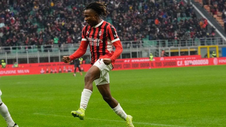AC Milan's Samuel Chukwueze celebrates after scoring his side's third goal during a Serie A match between AC Milan and Parma, at the San Siro stadium in Milan, Italy, Sunday, Jan. 26, 2025. (AP/Luca Bruno)