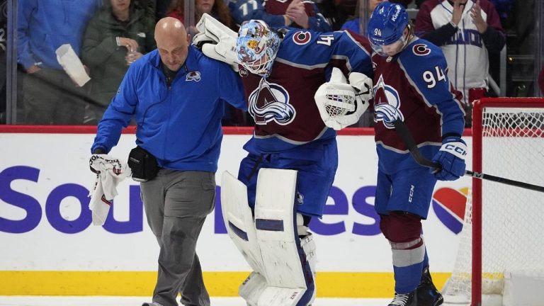 Colorado Avalanche goaltender Scott Wedgewood is helped off the ice after being injured  in the third period of an NHL game against the Buffalo Sabres, Thursday, Jan. 2, 2025, in Denver. (AP/David Zalubowski)