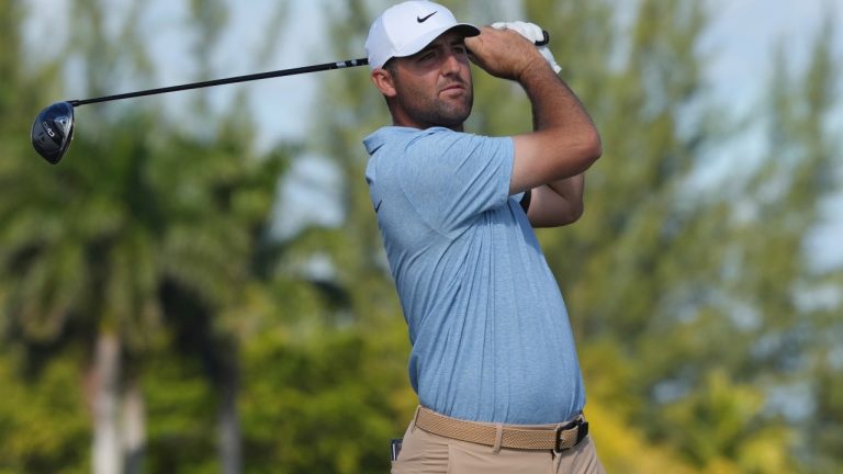 Scottie Scheffler, of the United States, watches his drive on the third hole during the final round of the Hero World Challenge PGA Tour at the Albany Golf Club, in New Providence, Bahamas, Sunday, Dec. 8, 2024. (AP/Fernando Llano)