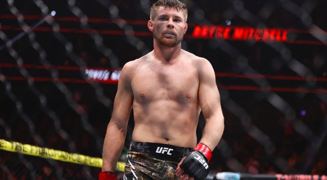 Bryce-Mitchell-stands-in-the-Octagon-after-defeating-Kron-Gracie-at-UFC-310