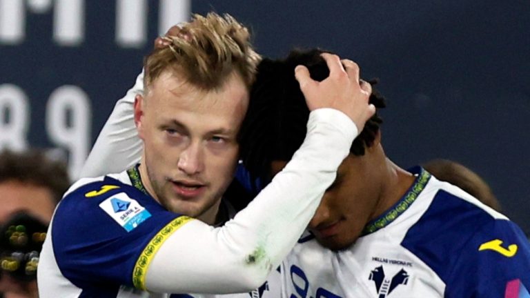 Verona's Casper Tengstedt, left, celebrates scoring during the Serie A soccer match between Bologna and Hellas Verona at Renato Dall'Ara Stadium, Bologna, Italy, Monday, Dec. 30, 2024. (Michele Nucci/LaPresse via AP)