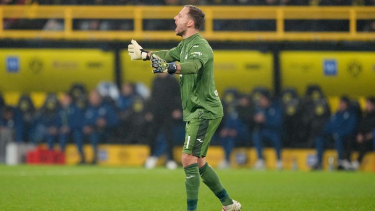 Hoffenheim's goalkeeper Oliver Baumann reacts during the German Bundesliga soccer match between Borussia Dortmund and TSG Hoffenheim at the Signal-Iduna Park in Dortmund, Germany, Sunday, Dec. 15 2024. (Martin Meissner/AP)