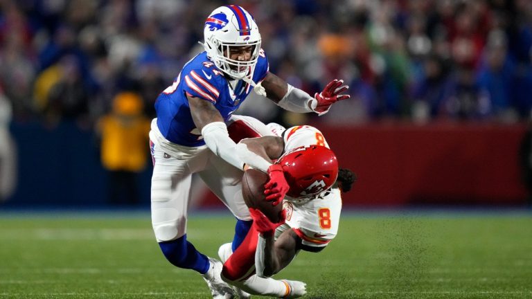 Kansas City Chiefs wide receiver DeAndre Hopkins (8) reaches for a pass Buffalo Bills cornerback Christian Benford defends during the second half of an NFL football game Sunday, Nov. 17, 2024, in Orchard Park, N.Y. (Julia Demaree Nikhinson/AP Photo)