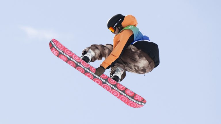 Cameron Spalding of Canada competes during the Snowboard Slopestyle Worldcup finals, on Corvatsch mountain in Silvaplana, Switzerland, Saturday, March 23, 2024, (Mayk Wendt/Keystone via AP)