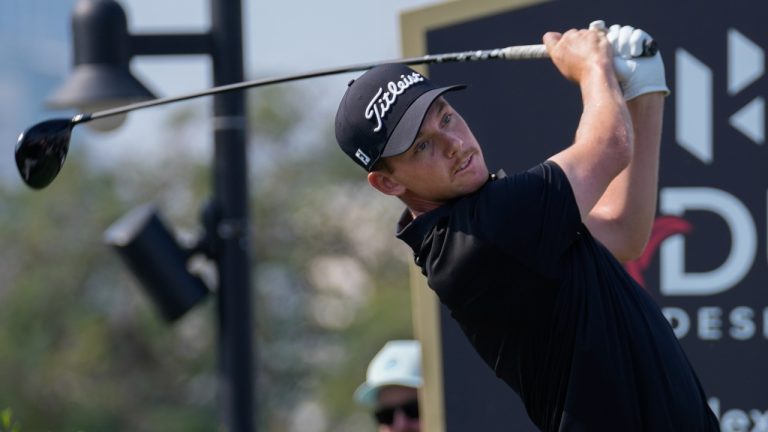 Daniel Hillier of New Zealand hits off the first tee during the third round of the Dubai Desert Classic golf tournament, in Dubai, United Arab Emirates, Saturday, Jan. 18, 2025. (Altaf Qadri/AP)