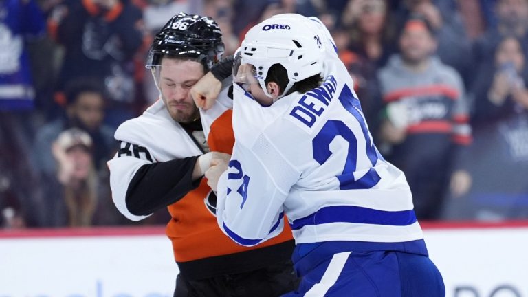 Philadelphia Flyers' Joel Farabee, left, and Toronto Maple Leafs' Connor Dewar fight during the first period of an NHL hockey game, Tuesday, Jan. 7, 2025, in Philadelphia. (Matt Slocum/AP)