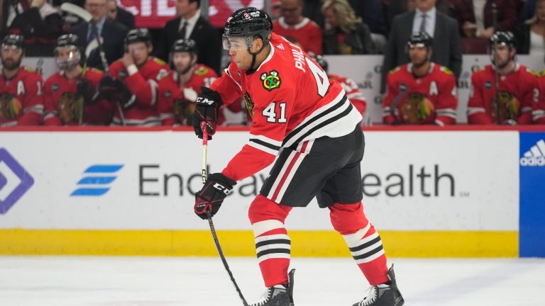 Chicago Blackhawks defenceman Isaak Phillips shoots the puck during the first period of an NHL hockey game against the Winnipeg Jets, Friday, Feb. 23, 2024, in Chicago. (Erin Hooley/AP)