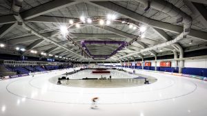 A skater races around the track at the Olympic Oval during ISU World Cup speed skating competition in Calgary, Alta., Friday, Dec. 16, 2022. (Jeff McIntosh/CP)