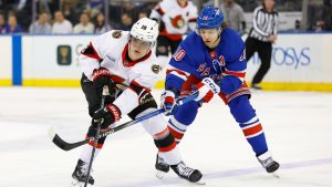 Ottawa Senators center Tim Stützle (18) plays the puck against New York Rangers left wing Artemi Panarin (10) during the second period of an NHL game, Tuesday, Jan. 21, 2025, in New York. (Noah K. Murray/AP)