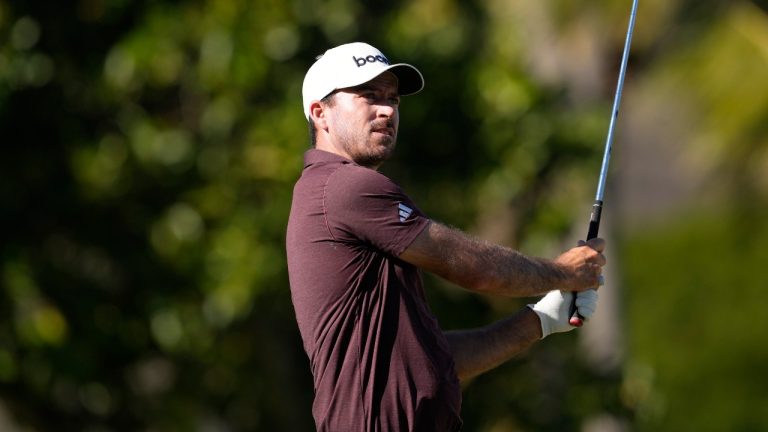 Nick Taylor, of Canada, watches his shot on the 11th hole during the first round of the Sony Open golf event, Thursday, Jan. 9, 2025, at Waialae Country Club in Honolulu. (Matt York/AP)