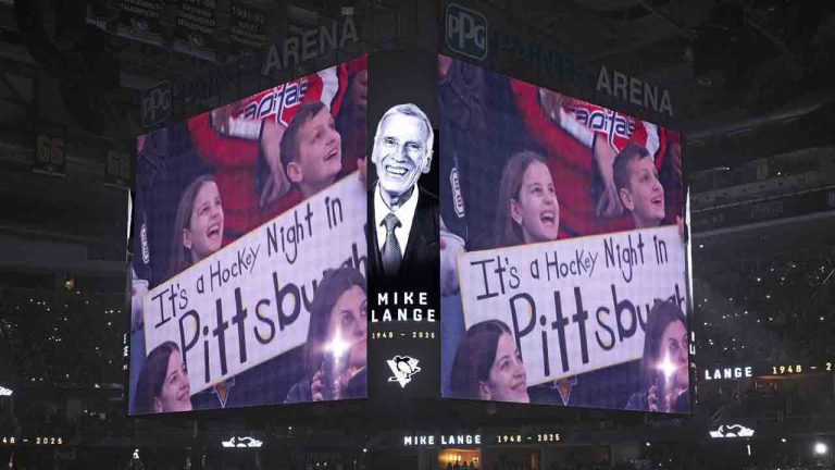 The Pittsburgh Penguins pay tribute to Penguins Hockey Hall of Fame announcer Mike Lange before an NHL hockey game between the Pittsburgh Penguins and the Washington Capitals in Pittsburgh, Saturday, Feb. 22, 2025. (Gene J. Puskar/AP)