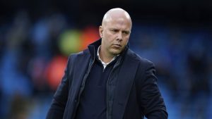 Liverpool's manager Arne Slot stands on the pitch prior to the English Premier League soccer match between Manchester City and Liverpool at Etihad stadium in Manchester, England, Sunday, Feb. 23, 2025. (Dave Thompson/AP)
