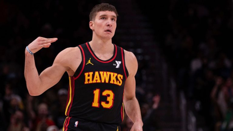Atlanta Hawks guard Bogdan Bogdanovic (13) celebrates his three-point shot during the second half of an NBA basketball game, Thursday, Jan. 23, 2025, in Atlanta. (Kathryn Skeean/AP)