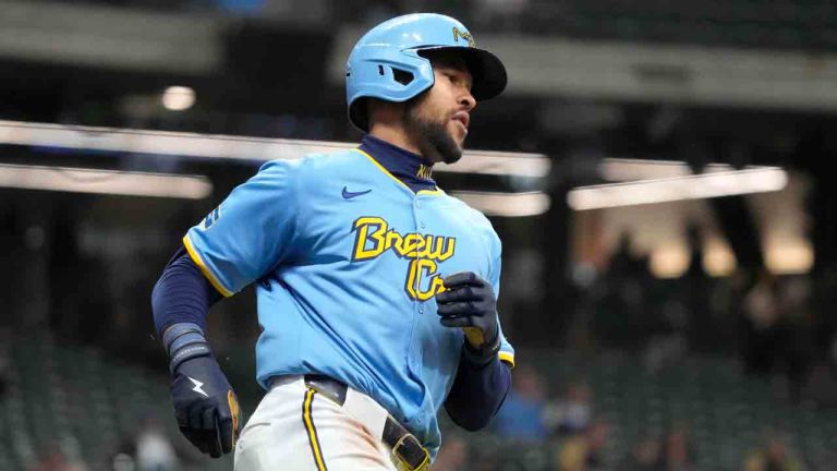 Milwaukee Brewers' Blake Perkins runs to first base on a ground ball single to right field during the seventh inning of a baseball game against the Colorado Rockies, Friday, Sept. 6, 2024, in Milwaukee. (Kayla Wolf/AP)