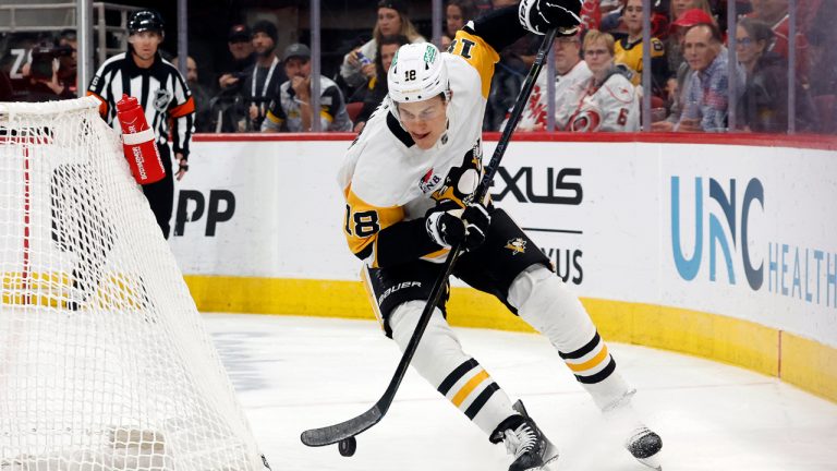 Pittsburgh Penguins' Jesse Puljujarvi controls the puck behind the net of the Carolina Hurricanes during the first period of an NHL game in Raleigh, N.C., Thursday, Nov. 7, 2024. (AP Photo/Karl B DeBlaker)