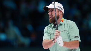 Shane Lowry of The Bay Golf Club watches a shot on the tenth hole, during the inaugural match of the TMRW Golf League, against New York Golf Club, Tuesday, Jan. 7, 2025, in Palm Beach Gardens, Fla. (AP Photo/Rebecca Blackwell)
