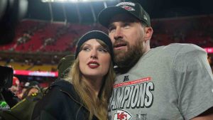 Kansas City Chiefs tight end Travis Kelce, right, is congratulated by Taylor Swift as they celebrate the Chiefs victory over the Buffalo Bills in the AFC Championship NFL football game, Sunday, Jan. 26, 2025, in Kansas City, Mo. (Charlie Riedel/AP)