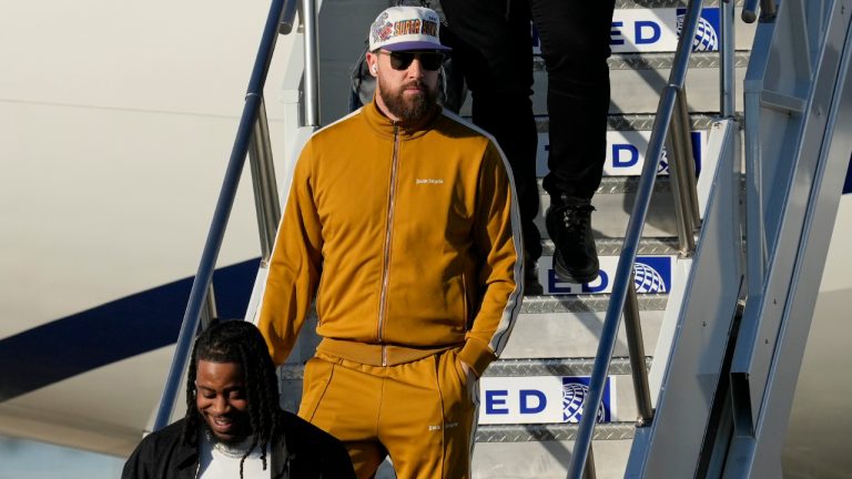 Kansas City Chiefs tight end Travis Kelce arrives at New Orleans international airport, Sunday, Feb. 2, 2025, ahead of Super Bowl 59 between the Philadelphia Eagles and the Kansas City Chiefs. (AP Photo/David J. Phillip)