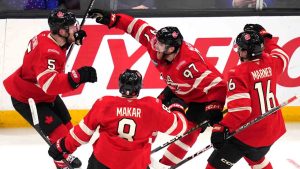 Canada's Connor McDavid (97) celebrates after his winning goal against the United States during an overtime period of the 4 Nations Face-Off championship hockey game, Thursday, Feb. 20, 2025, in Boston. (Charles Krupa/AP)