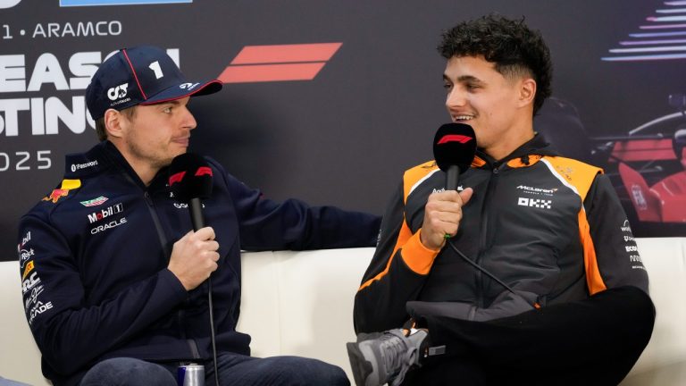 Red Bull driver Max Verstappen of the Netherlands, left, and McLaren driver Lando Norris of Britain talk at a press conference during a Formula One pre-season test at the Bahrain International Circuit in Sakhir, Bahrain, Thursday, Feb. 27, 2025. (AP/Darko Bandic)