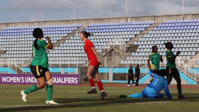 Lea Larouche, centre, celebrates one of her three goals Friday, Feb. 21, 2025, in Canada's 22-0 win over Dominica in CONCACAF U-20 women's qualifying play in Port of Spain, Trinidad. THE CANADIAN PRESS/HO - Canada Soccer