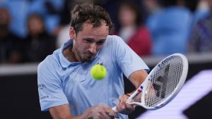 Daniil Medvedev of Russia plays a backhand return to Learner Tien of the U.S. during their second round match at the Australian Open tennis championship in Melbourne, Australia, Thursday, Jan. 16, 2025. (Ng Han Guan/AP)