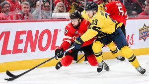 Canada's Drew Doughty (89) defends against Sweden's Lucas Raymond (23) during second period 4 Nations Face-Off hockey action in Montreal, Wednesday, February 12, 2025. (Graham Hughes/CP)