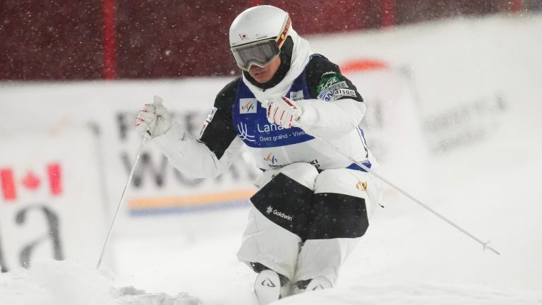 Japan's Ikuma Horishima skis in the qualification run of the men's World Cup freestyle skiing moguls in Saint-Come, Que., Friday, Jan. 31, 2025. Horishima overcame a wobbly start to edge Canadian star Mikael Kingsbury for gold at a moguls World Cup stop Friday. THE CANADIAN PRESS/Sean Kilpatrick