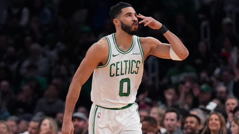 Boston Celtics forward Jayson Tatum blows a kiss after hitting a 3-pointer against the San Antonio Spurs during the first half of an NBA basketball game, Wednesday, Feb. 12, 2025, in Boston. (AP Photo/Charles Krupa)