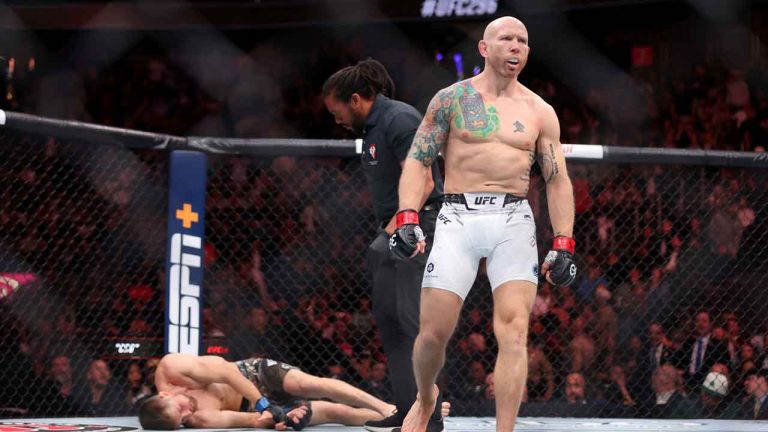Featherweight fighter Josh Emmett walks away from Bryce Mitchell after a first-round knockout during the UFC 296 mixed martial arts event. (Steve Marcus/AP)