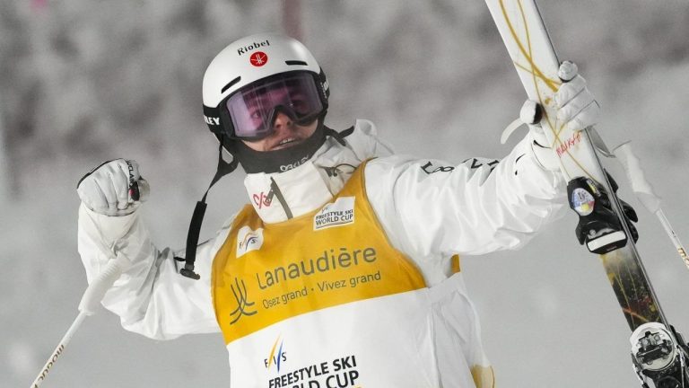Canadian Mikael Kingsbury celebrates after winning the men's World Cup freestyle skiing dual moguls in Saint-Come, Que., Saturday, Feb. 1, 2025. (Sean Kilpatrick/CP)