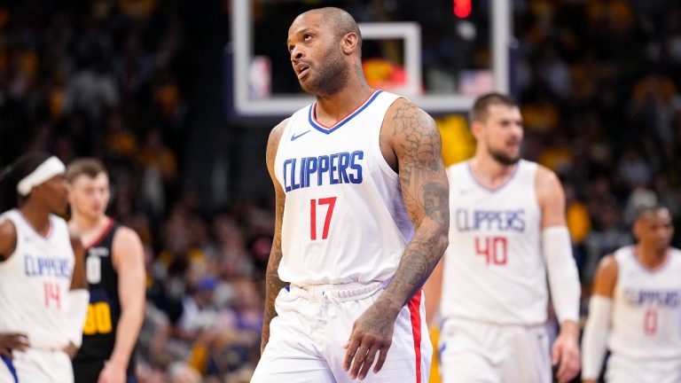 Los Angeles Clippers forward P.J. Tucker reacts during the first half of the team's NBA basketball in-season tournament game against the Denver Nuggets on Tuesday, Nov. 14, 2023, in Denver. (AP Photo/Jack Dempsey, File)