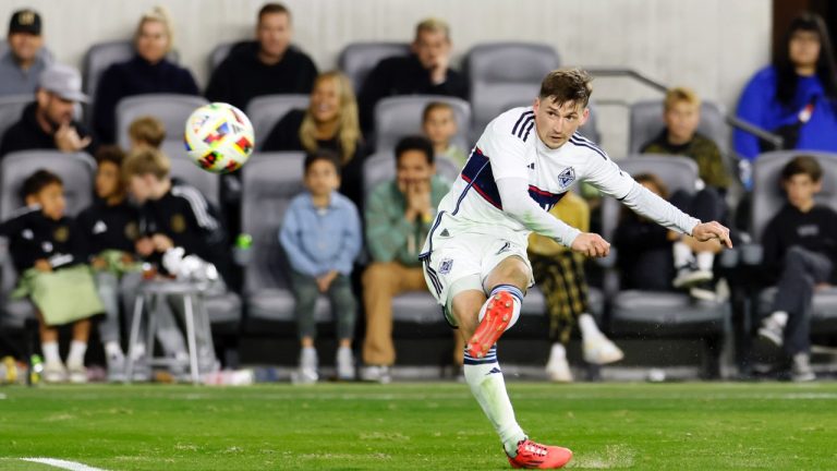 Vancouver Whitecaps' Ryan Gauld shoots a free kick during the second half of a first-round MLS Cup playoffs soccer match, in Los Angeles, Friday, Nov. 8, 2024. (Etienne Laurent/CP/AP)