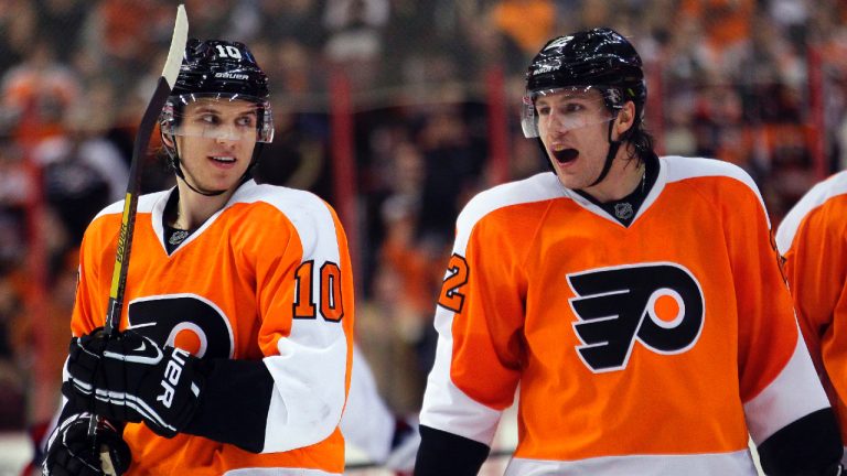 Brayden Schenn, left, looks towards his brother Luke, right, during the second period of an NHL hockey game on Feb 27, 2013, in Philadelphia. (Tom Mihalek/AP)