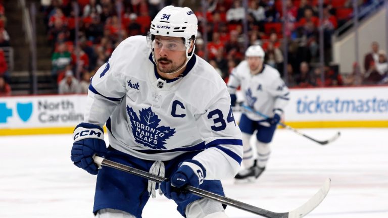 Toronto Maple Leafs' Auston Matthews (34) chases the puck against the Carolina Hurricanes during the first period of an NHL hockey game in Raleigh, N.C., Thursday, Jan. 9, 2025. (Karl DeBlaker/AP)