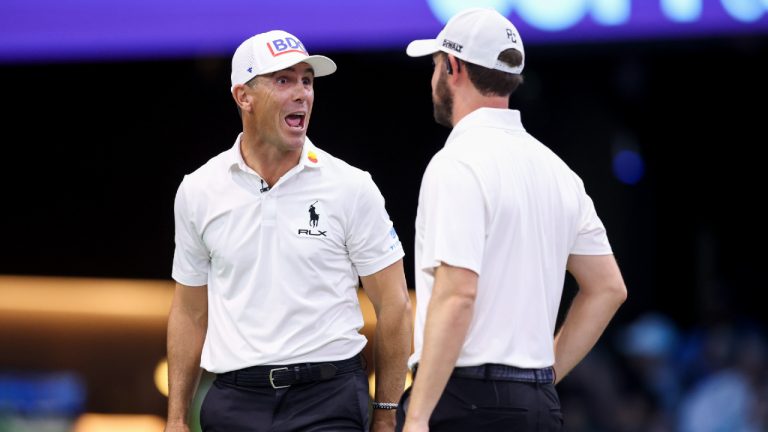 Billy Horschel of Atlanta Drive GC talks with teammate Patrick Cantlay. (Photo by Megan Briggs/TGL/TGL via Getty Images)