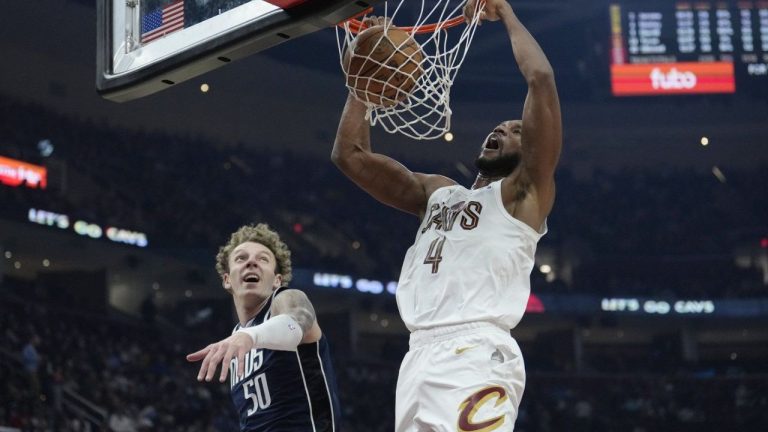 Cleveland Cavaliers forward Evan Mobley (4) dunks in front of Dallas Mavericks centre Kylor Kelley (50) in the first half of an NBA basketball game, Sunday, Feb. 2, 2025, in Cleveland. (Sue Ogrocki/AP)
