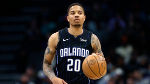 Orlando Magic guard Markelle Fultz brings the ball up court against the Charlotte Hornets during the second half of an NBA basketball game in Charlotte, N.C., Friday, April 5, 2024. (Nell Redmond/AP)