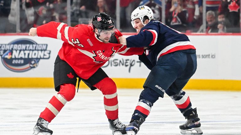 Canada's Brandon Hagel (38) fights with the United States' Matthew Tkachuk (19) during the 4 Nations Face-Off in February. (Photo by Graham Hughes/CP)
