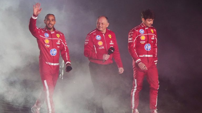 Ferrari drivers Charles Leclerc, right, and Lewis Hamilton, left, with team principal Fred Vasseur, centre, during the F1 75 Live event at the O2 arena in London, England, Tuesday, Feb. 18, 2025. (Bradley Collyer/PA via AP)