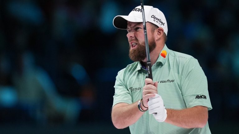 Shane Lowry of The Bay Golf Club watches a shot on the 10th hole, during the inaugural match of the TMRW Golf League, against New York Golf Club, Tuesday, Jan. 7, 2025, in Palm Beach Gardens, Fla. (Rebecca Blackwell/AP)