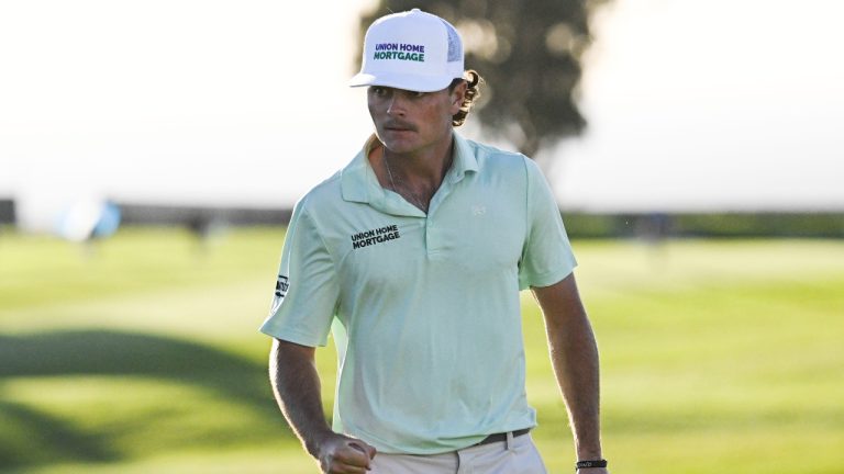 Luke Clanton pumps his fist after hitting a birdie putt on the 13th hole of the South Course at Torrey Pines during the second round of the Farmers Insurance Open golf tournament Thursday, Jan. 23, 2025, in San Diego. (Denis Poroy/AP)