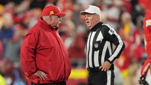 Kansas City Chiefs head coach Andy Reid, left, talks with referee Bill Vinovich (52) before an NFL football game between the Kansas City Chiefs and the Los Angeles Chargers Sunday, Dec. 8, 2024, in Kansas City, Mo. (Charlie Riedel/AP Photo)