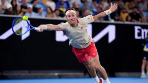 Casper Ruud of Norway plays a forehand return to Jakub Mensik of the Czech Republic during their second round match at the Australian Open tennis championship in Melbourne, Australia, Wednesday, Jan. 15, 2025. (Ng Han Guan/AP)