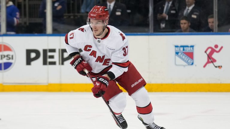 Carolina Hurricanes' Andrei Svechnikov moves the puck up the ice during the second period of an NHL hockey game against the New York Rangers, Tuesday, Jan. 28, 2025, in New York. (Seth Wenig/AP)