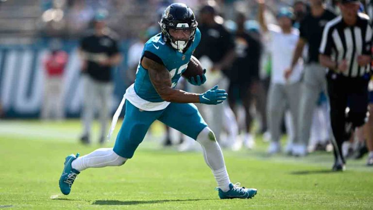 Jacksonville Jaguars wide receiver Christian Kirk (13) runs after catching a pass against the Green Bay Packers during the second half of an NFL football game, Sunday, Oct. 27, 2024, in Jacksonville, Fla. (Phelan M. Ebenhack/AP)
