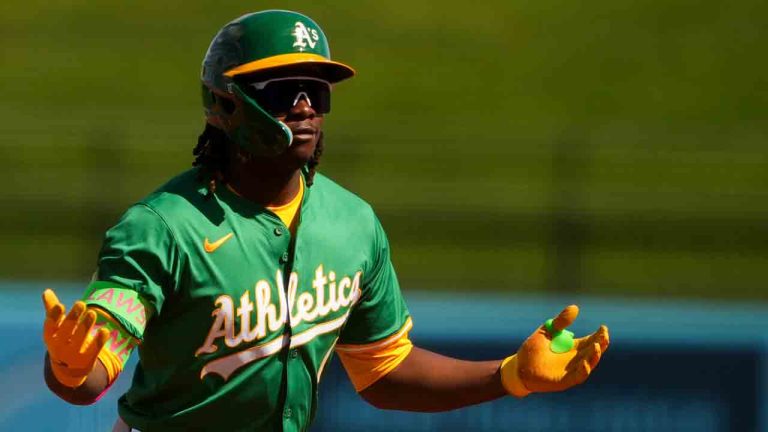 Athletics' Lawrence Butler reacts after hitting a single against the Kansas City Royals during the first inning of a spring training baseball game Monday, Feb. 24, 2025, in Surprise, Ariz. (Lindsey Wasson/AP)