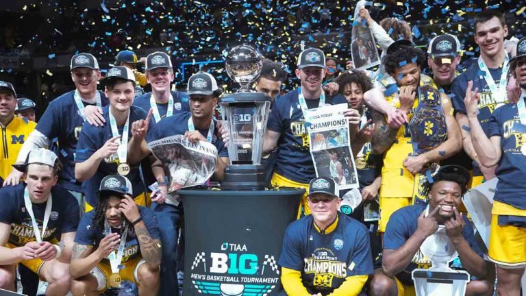 Michigan celebrates after an NCAA college basketball game against Wisconsin in the championship of the Big Ten Conference tournament in Indianapolis, Sunday, March 16, 2025. (Michael Conroy/AP)
